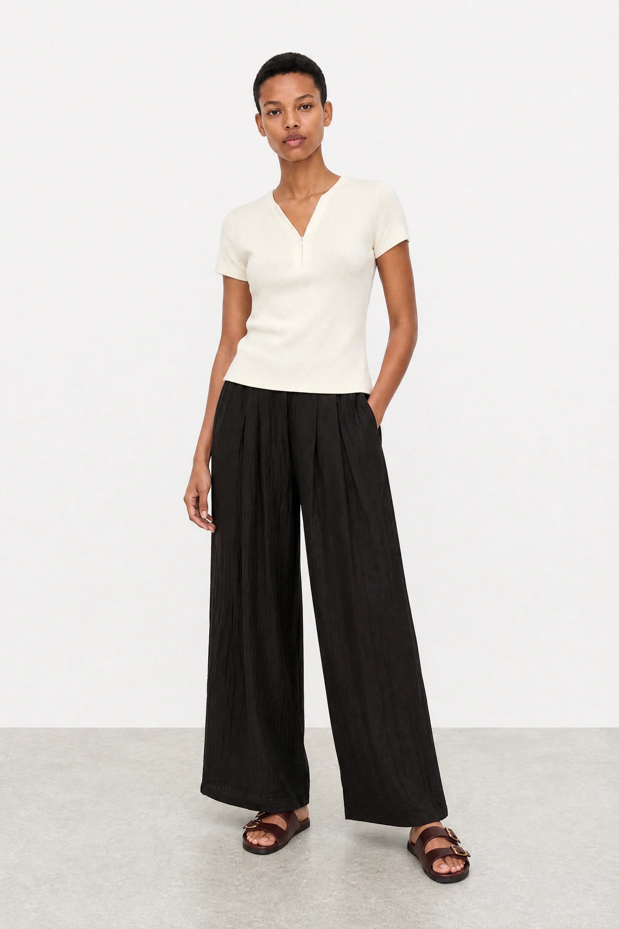 White ribbed zip front knit tee