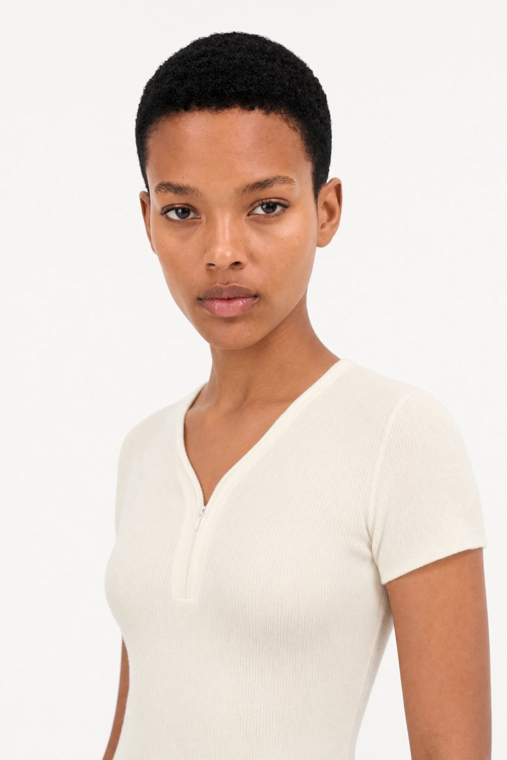 White ribbed zip front knit tee