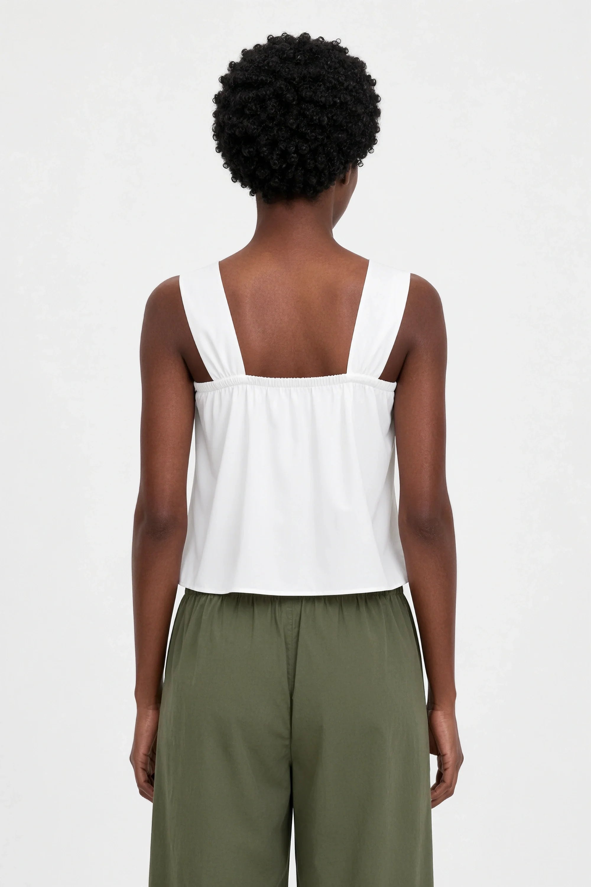 White silky cross strap tank