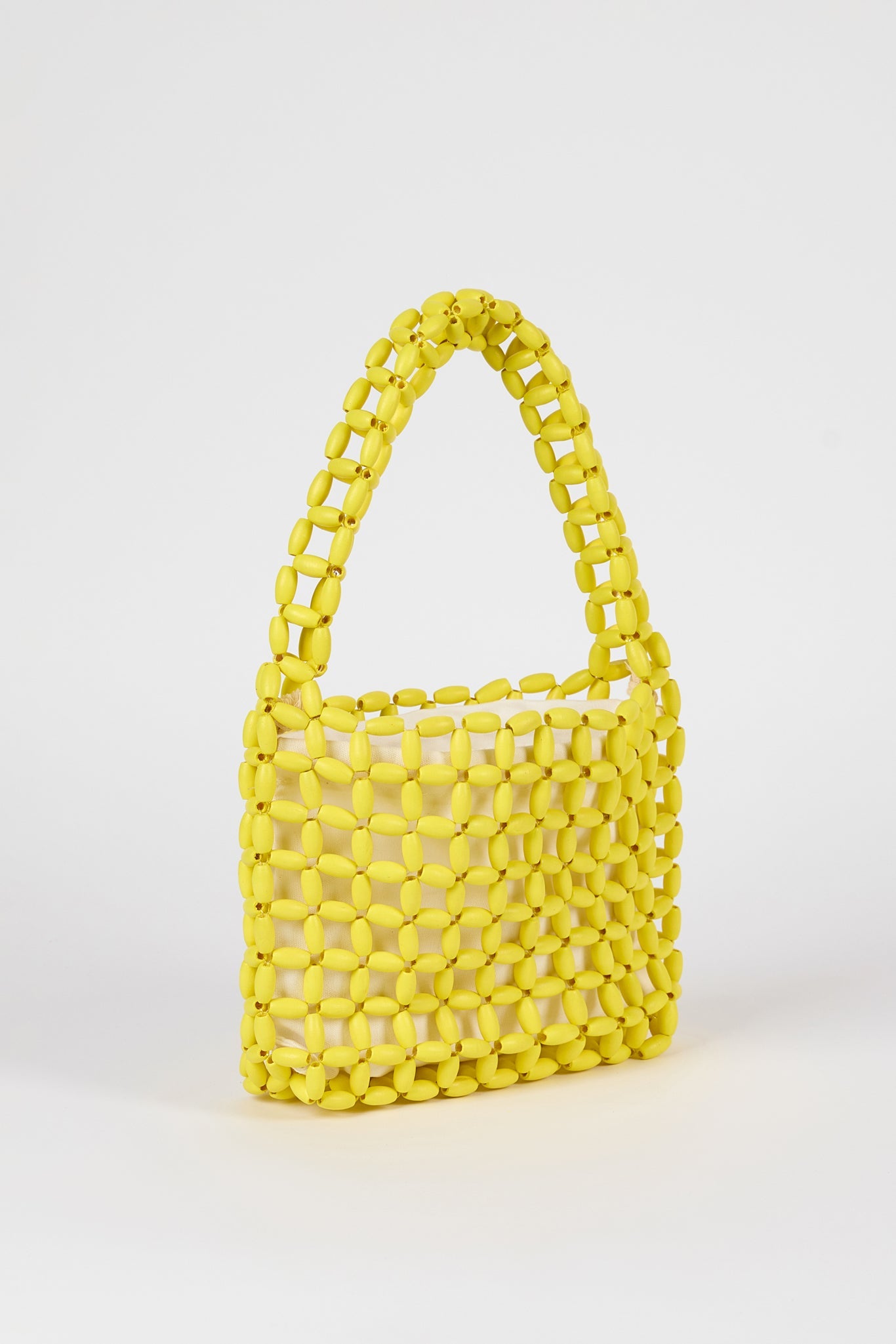 Yellow wooden beaded mini shoulder bag