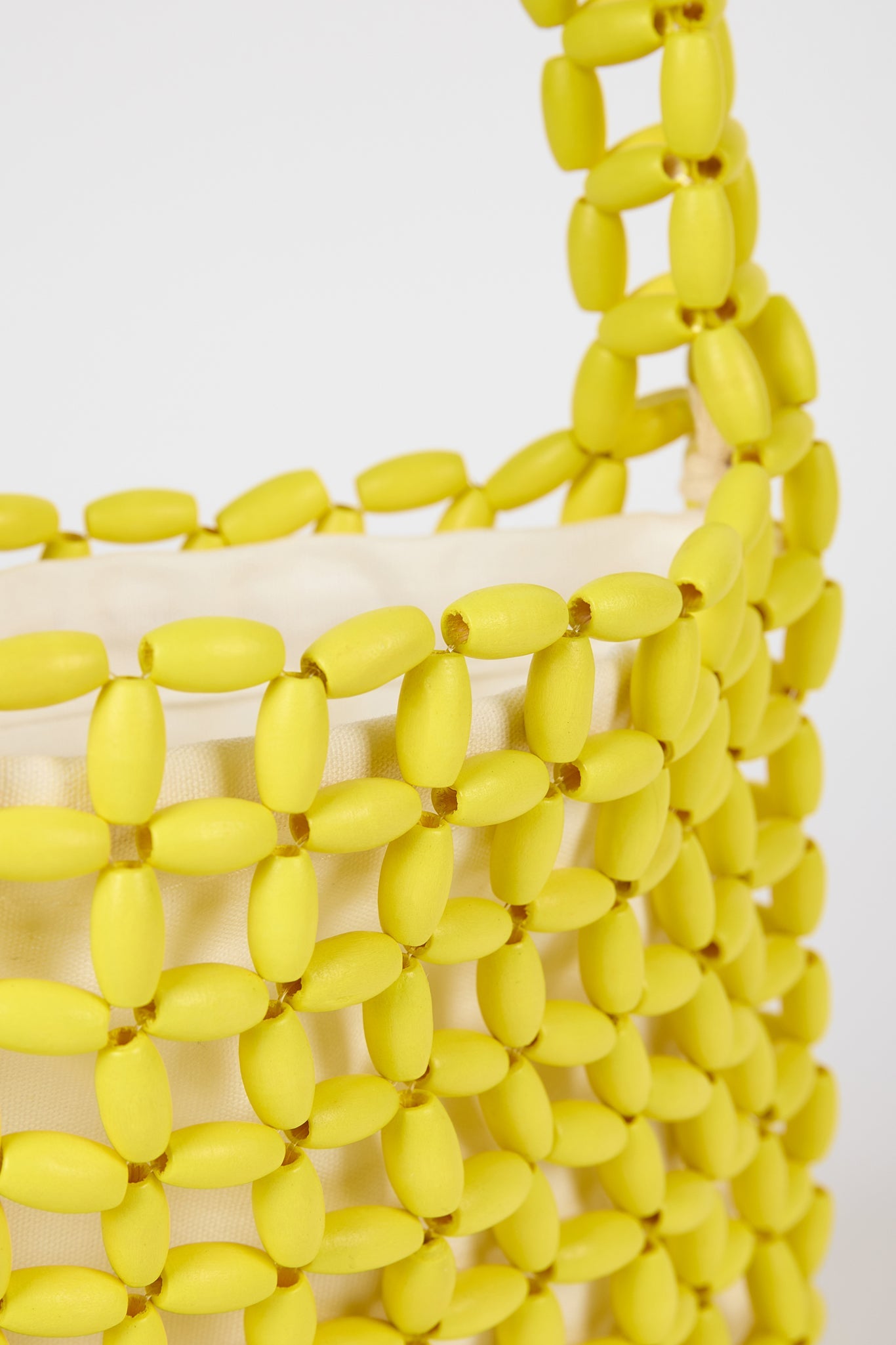 Yellow wooden beaded mini shoulder bag