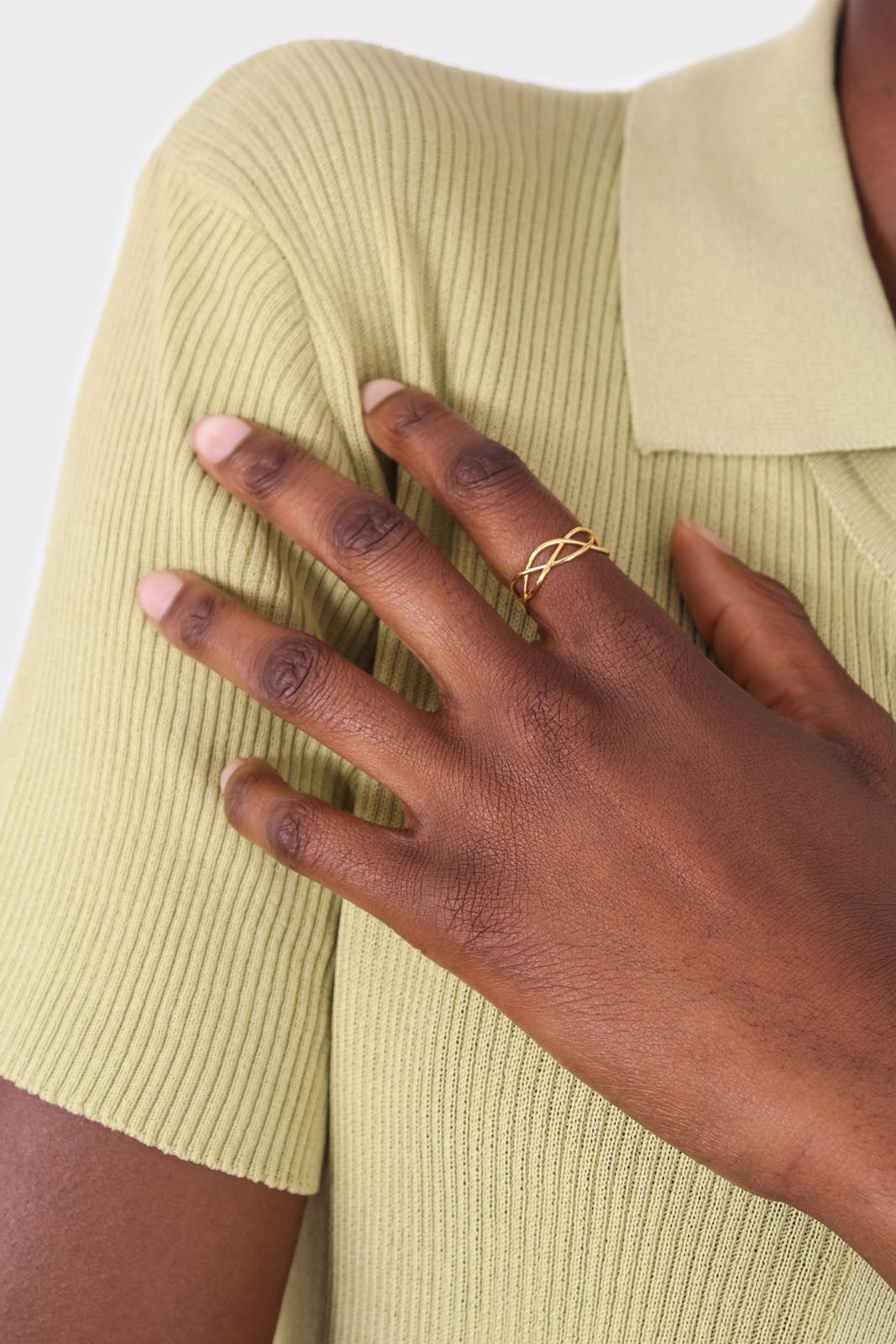 Gold interwoven strands ring